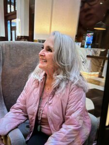 Janet Meadows smiles and looks up