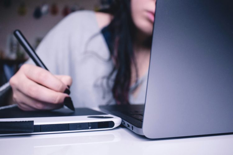 Woman at laptop. Photo by Josefa Ndiaz, Unsplash